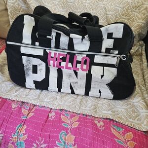 PINK XL rolling Duffle bag. Rare gem! Reasonable offers considered